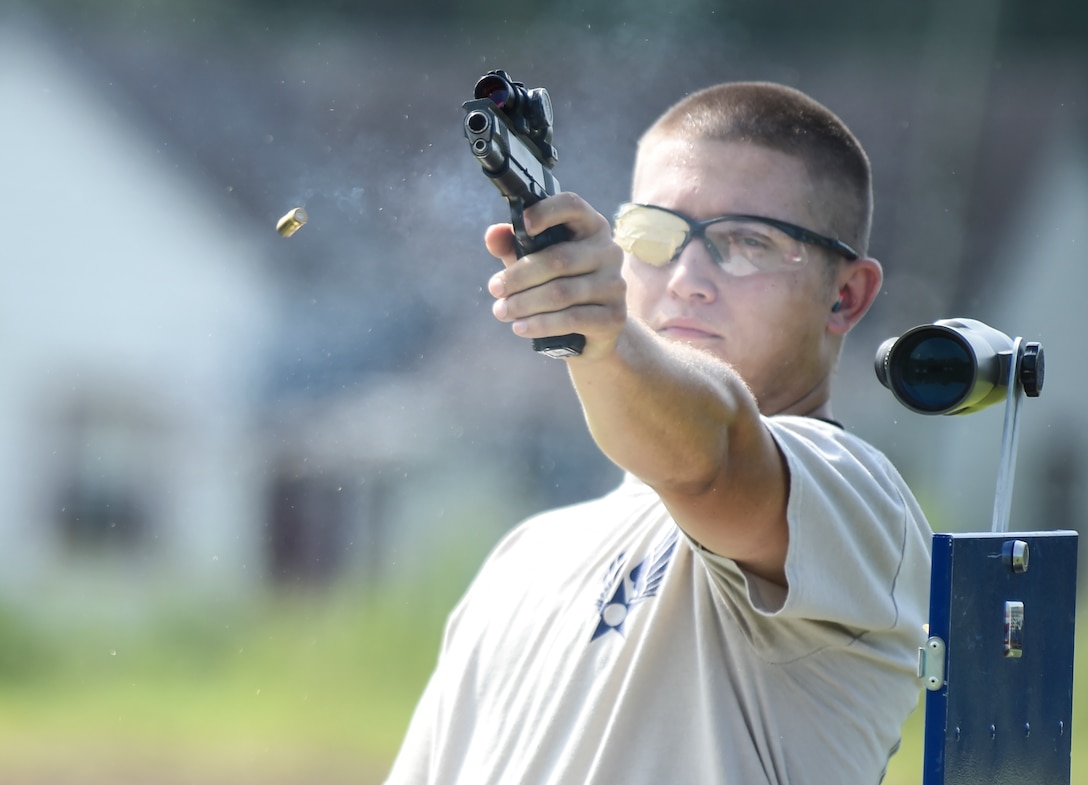 U.S. Air Force Staff Sgt. Jeremiah Jackson, 23d Equipment Maintenance Squadron aircraft metal technology craftsman, fires his .45-caliber pistol during pistol shooting practice Sept. 4, 2015, in Valdosta, Ga. Jackson has been a member of the Air Force’s National Pistol Team for five years. (U.S. Air Force photo by Senior Airman Ceaira Tinsley/Released)