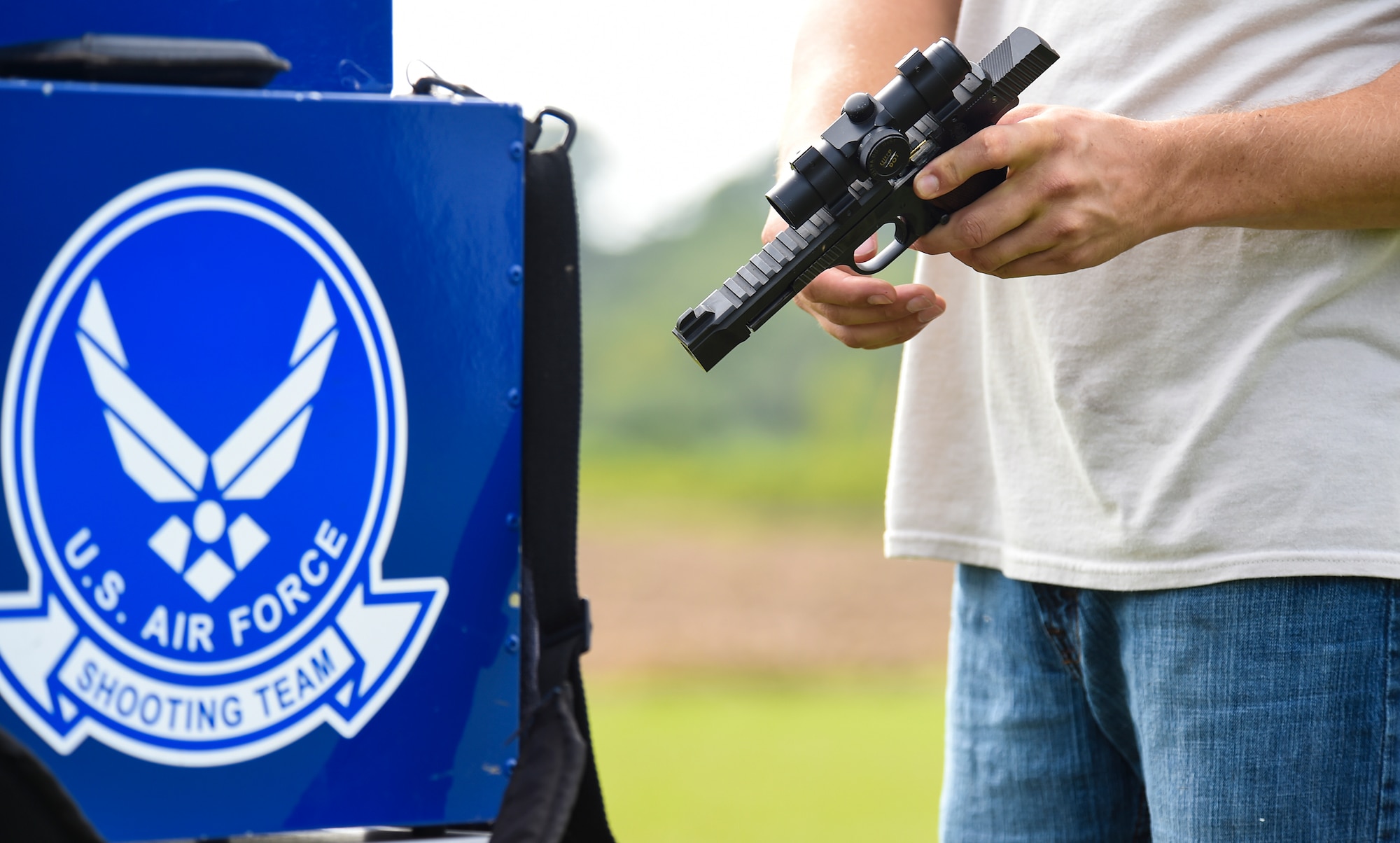 U.S. Air Force Staff Sgt. Jeremiah Jackson, 23d Equipment Maintenance Squadron aircraft metal technology craftsman, loads his .45-caliber pistol during pistol shooting practice Sept. 4, 2015, in Valdosta, Ga. Jackson practices shooting drills two to three times a week to imitate how he’d compete in competitions. (U.S. Air Force photo by Senior Airman Ceaira Tinsley/Released)