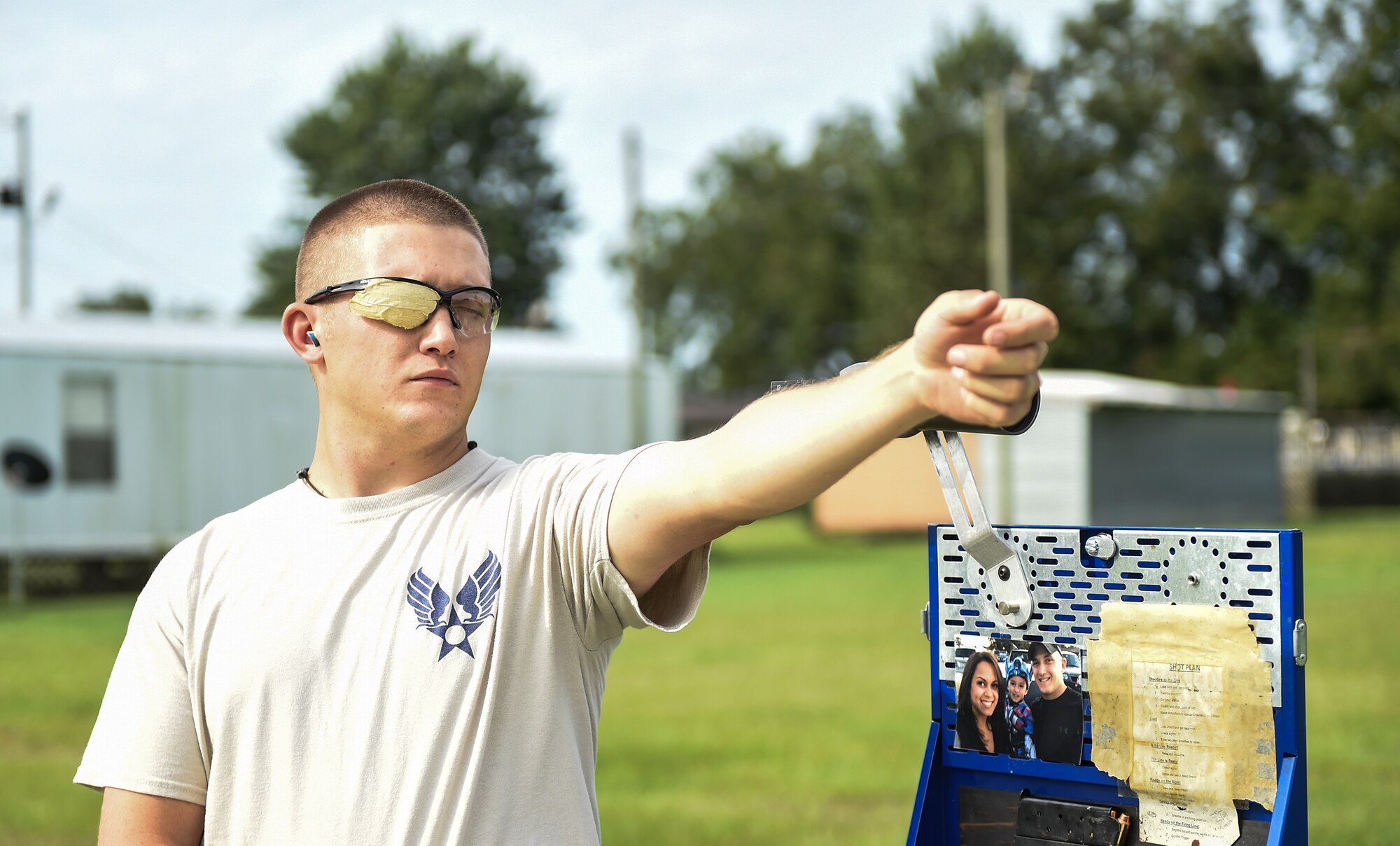 U.S. Air Force Staff Sgt. Jeremiah Jackson, 23d Equipment Maintenance Squadron aircraft metal technology craftsman and member of the Air Force National Pistol Team, visualizes the target during pistol shooting practice Sept. 4, 2015, in Valdosta, Ga. Jackson practices visualizing his shots to mentally prepare for every competition. (U.S. Air Force photo by Senior Airman Ceaira Tinsley/Released)