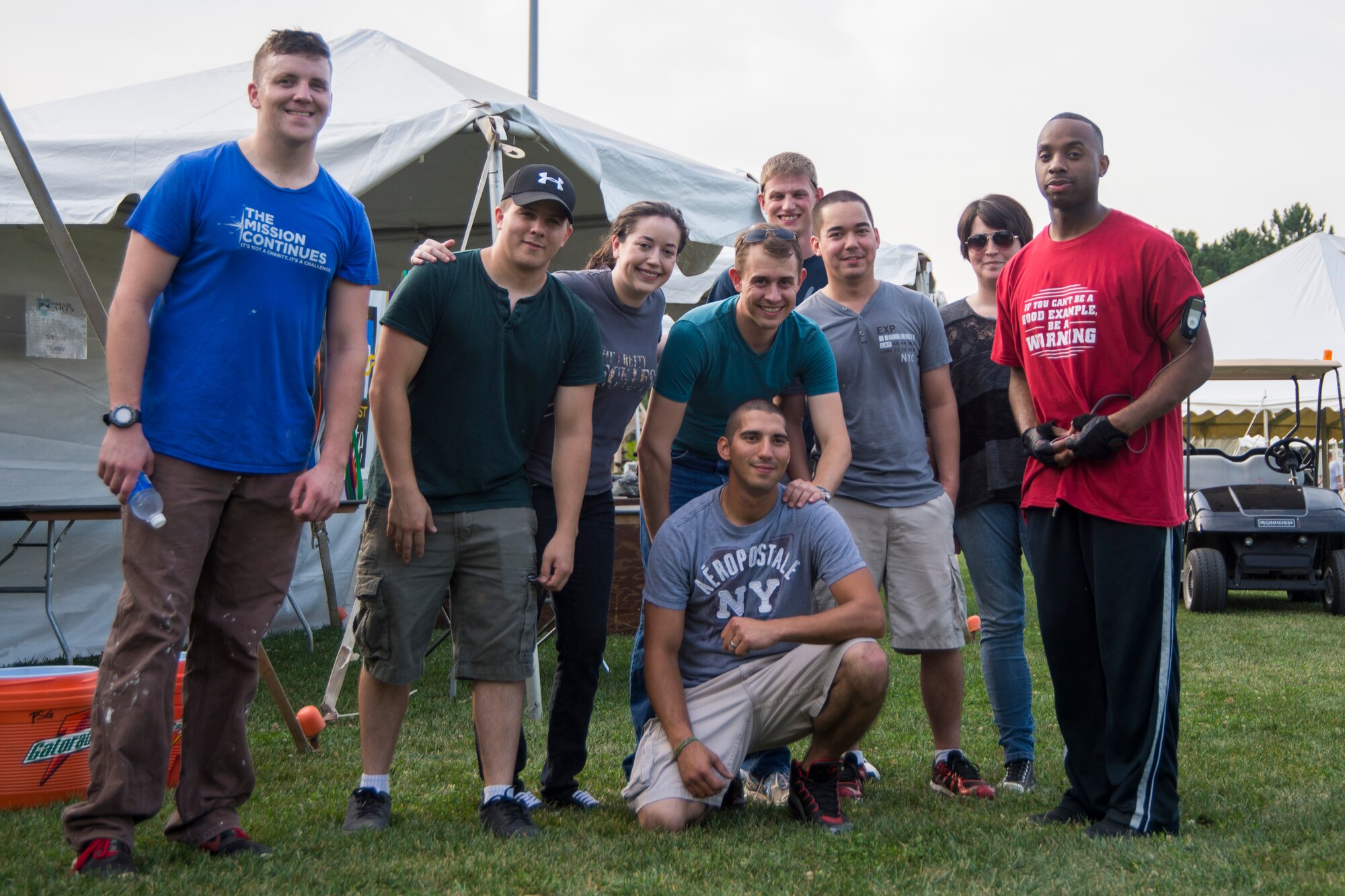 Scott Airmen volunteer for the 27th Midwest Salute to the Arts Aug. 27 and 30 at Everett Moody Park, Scott Air Force Base, Illinois. Airmen were in charge of setting-up and breaking-down the event. (U.S. photo by Airmen 1st Class Melissa Estevez)