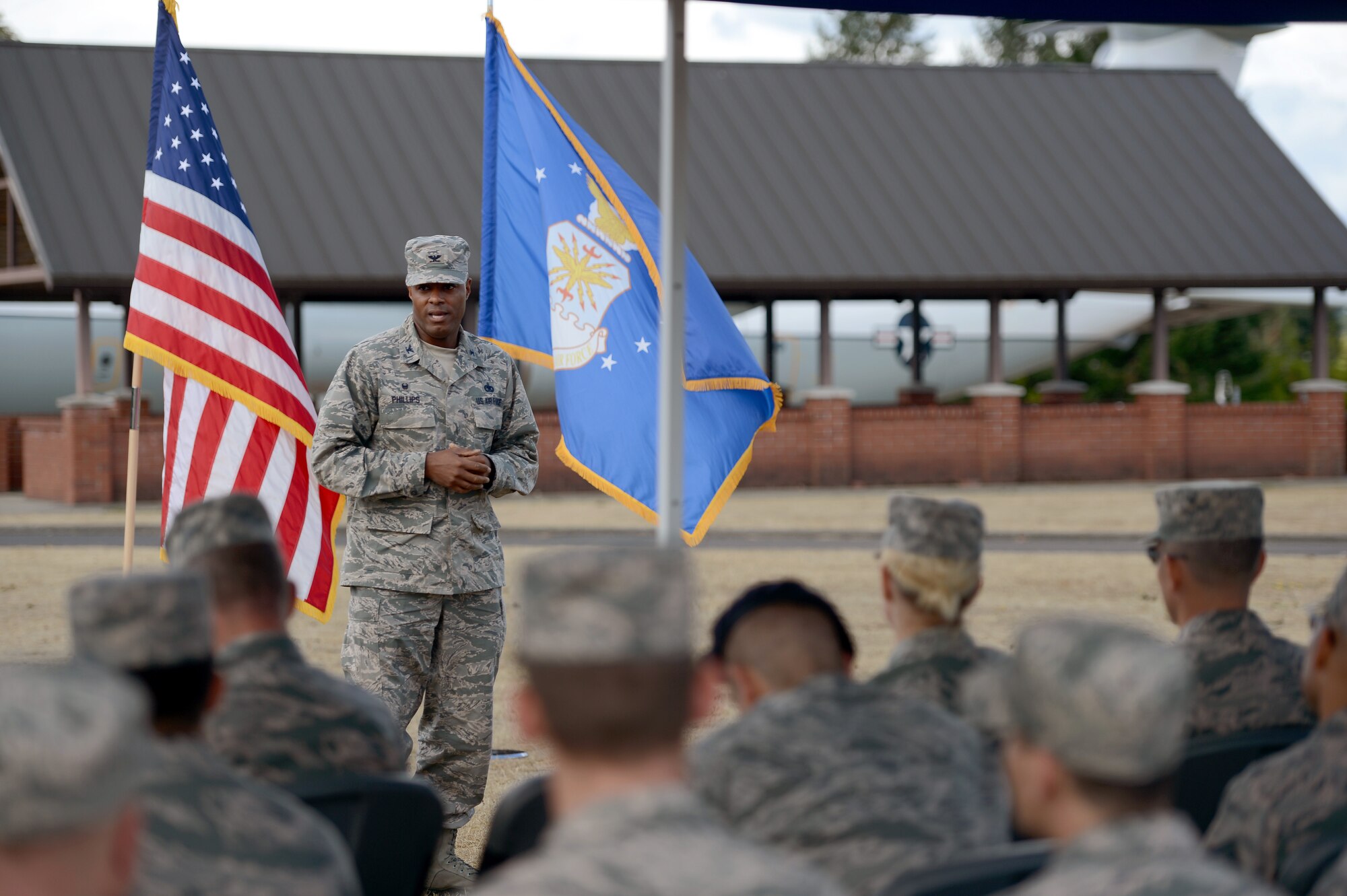 Col. Will Phillips, 627th Air Base Group commander, gives a speech, Sept. 2, 2015, during an honor guard graduation ceremony at Joint Base Lewis-McChord, Wash. The McChord Field Honor Guard performs many different ceremonies that range from promotions to funerals and at times are the first or last encounter one may have with the military. (U.S. Air Force photo/Airman 1st Class Keoni Chavarria)
