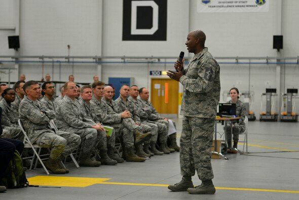 U.S. Air Force Chief Master Sgt. Kaleth Wright, Third Air Force and 17th Expeditionary Air Force command chief, address Team Mildenhall during an all-call Sept. 9, 2015, on RAF Mildenhall, England. Wright and U.S. Air Force Lt. Gen. Timothy Ray, Third Air Force and 17th Expeditionary Air Force commander, visited the base to meet with leadership and Airmen. (U.S. Air Force photo by Staff Sgt. Micaiah Anthony/Released)