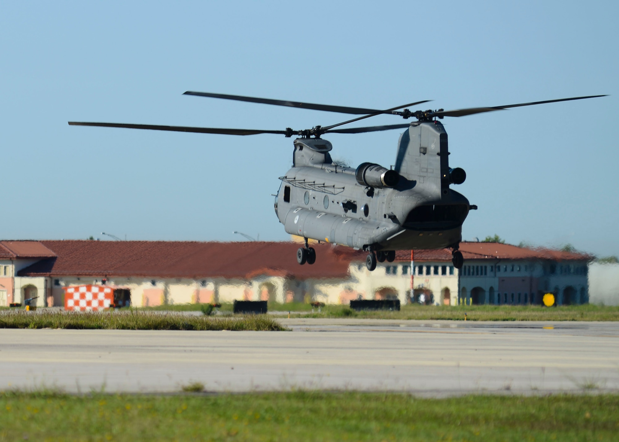 A Dutch air force CH-47 Chinook takes off from Aviano Air Base, Italy, during a 3-week mountain flying training exercise, Sept. 8, 2015. Approximately 200 Dutch air force personnel participated in the exercise to train 15 new helicopter pilots on mountainous terrain flying operations. (U.S. Air Force photo by Senior Airman Austin Harvill/Released)