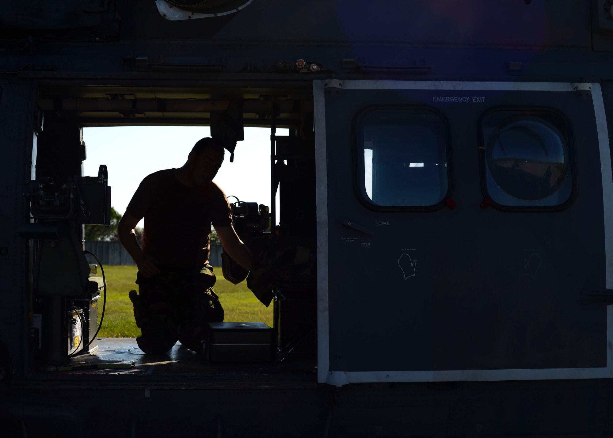 A Dutch air force AS532 Cougar crew member prepares for flight during a 3-week mountain flying training exercise, Sept. 8, 2015, at Aviano Air Base, Italy. Approximately 200 Dutch air force personnel participated in the exercise to train 15 new helicopter pilots on mountainous terrain flying operations. (U.S. Air Force photo by Senior Airman Austin Harvill/Released)
