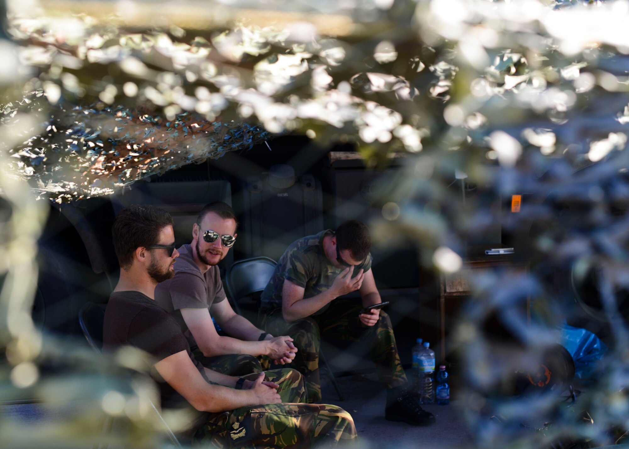 Dutch air force personnel take a break during a 3-week mountain flying training exercise, Sept. 8, 2015, at Aviano Air Base, Italy. Approximately 200 Dutch air force personnel participated in the exercise to train 15 new helicopter pilots on mountainous terrain flying operations. (U.S. Air Force photo by Senior Airman Austin Harvill/Released)