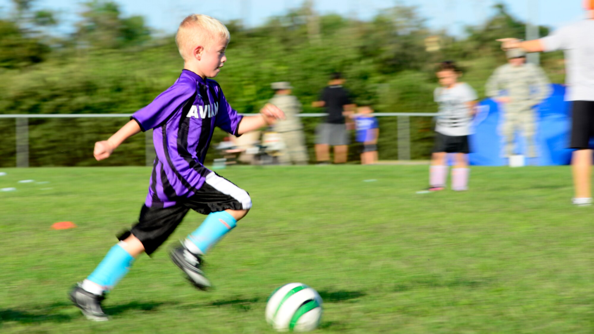 Gabriel Biermann practices controlling a soccer ball during practice Sept. 8, 2015 at Aviano Air Base, Italy. The Aviano Youth Program hosts soccer practice for different age groups twice a week. The soccer season, which ends Oct. 31, is the largest AYP program with more than 300 participants. (U.S. Air Force photo by Senior Airman Areca T. Bell/Released)