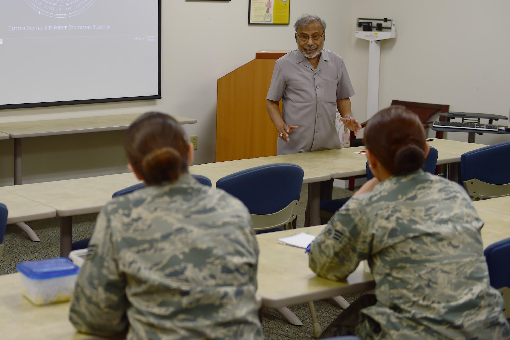Dr. Anant Jain, 460th Medical Group family advocacy outreach manager, proctors the Love and Logic course for parenting children Sept. 9, 2015, on Buckley Air Force Base, Colo. The Love and Logic course is a behavioral health interactive seminar relating to parenting tools using love and logic techniques. It focuses on allowing your child to make good behavioral choices and teach responsibility and respect. (U.S. Air Force photo by Airman 1st Class Luke W. Nowakowski/Released) 
