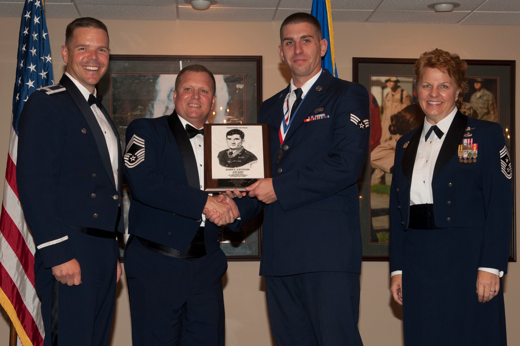 Senior Airman Andrew Schmitz, a 19th Maintenance Squadron aircraft structural maintenance journeyman, received the John Levitow Award Sept. 3, 2015, at Little Rock Air Force Base, Ark. The Levitow Award is presented to the student that demonstrates outstanding leadership and scholastic qualities. (U.S. Air Force photo by Senior Airman Scott Poe)