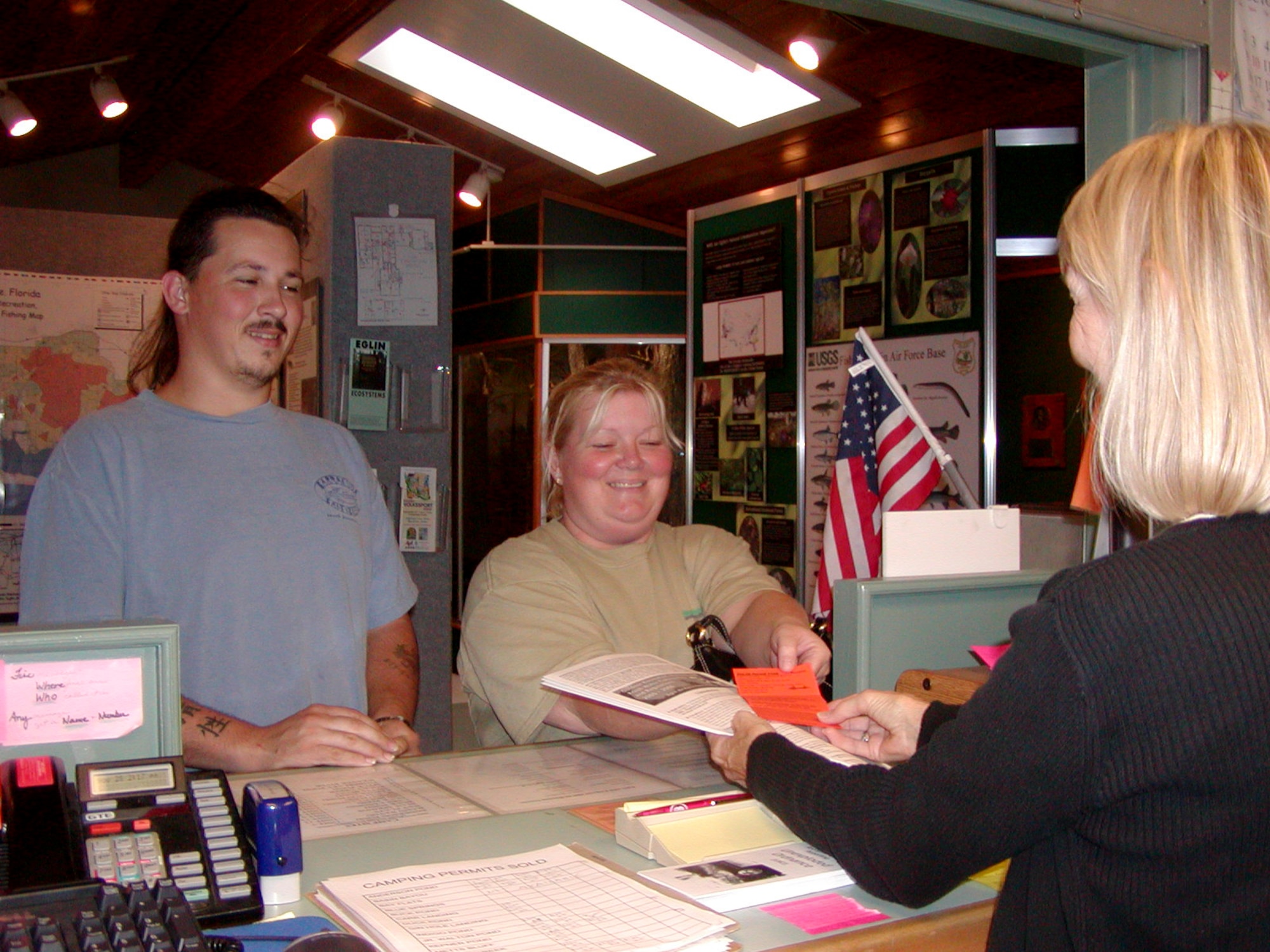 A customer purchases an outdoor recreation permit from Eglin's Jackson Guard in Niceville, Fla. A new web-based electronic permit system, called iSportsman, will debut online Tuesday, allowing users to purchase annual outdoor recreation permits online for the first time. Implementation of the iSportsman program is a Department of Defense initiative already in place at many installations across the country, as well as private and state facilities. 
