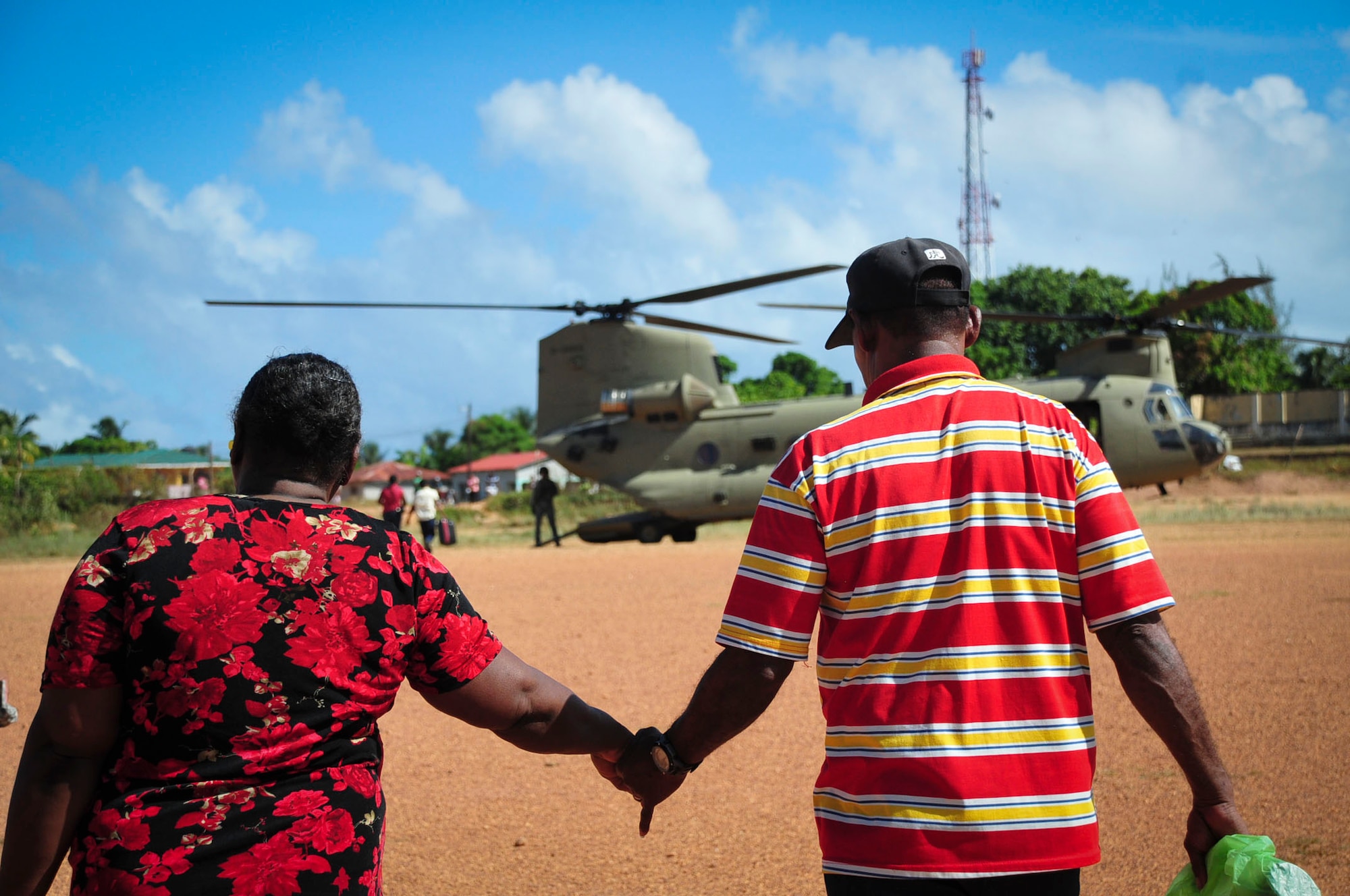TRUJILLO, Honduras – A man and woman from Gracias a Dios, a remote department in eastern Honduras, prepare to board a CH-47 “Chinook” for a flight from Puerto Lempira to Trujillo, Honduras, Aug. 27, 2015. Joint Task Force-Bravo partnered with the Honduran Government to transport 25 patients and their escorts for eye care as part of Continuing Promise 2015, a U.S. Southern Command-sponsored exercise that builds partnership with nations throughout Central and South America and the Caribbean. (U.S. Air Force photo by Capt. Christopher Love)
