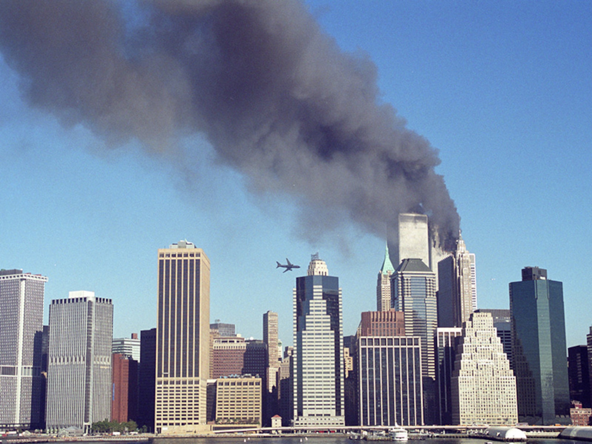 Flying the plane at 587 miles per hour, hijackers crash Flight 175 into the south face of floors 77 to 85 of the World Trade Center's South Tower, instantly killing the 60 on the plane and unknown hundreds within the tower. ( Photo courtesy of Kelly Guenther/Released)

