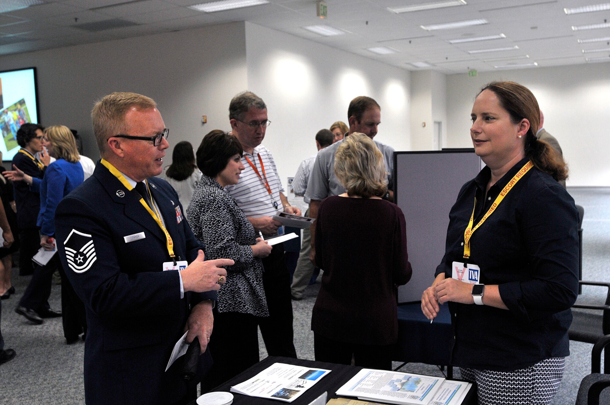KNOXVILLE, Tenn. - Master Sgt. Bill Conner, from the I.G. Brown Training and Education Center, speaks with Elise Eustace from the Foothills Land Conservancy, Sept. 10, 2015, during the Combined Federal Campaign 2015 kickoff event. More than 30 charitable organizations set up information booths at the event inside the Tennessee Valley Authority complex. Conner volunteered as a loaned executive for this year's campaign. (U.S. Air National Guard photo by Master Sgt. Mike R. Smith/Released) 
