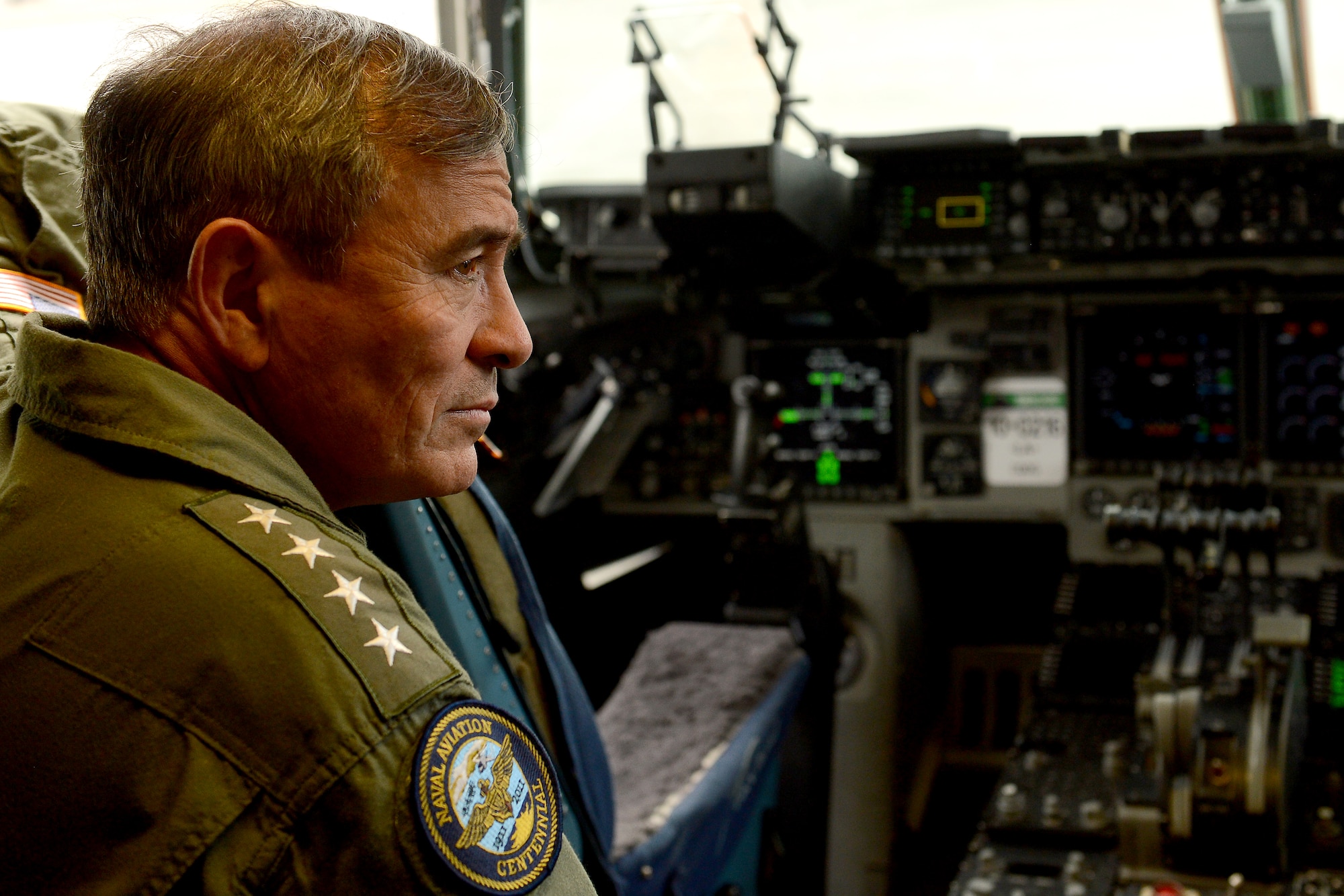 Admiral Harry B. Harris Jr., Pacific Command commander, receives a brief on the capabilities of the C-17 Globemaster III, Sept. 8, 2015, at Joint Base Lewis-McChord, Wash. Harris has served in every geographic combatant command region in the world and now commands the largest of the six combatant commands, an area that is home to 50 percent of the world’s population. (U.S. Air Force photo/Staff Sgt. Tim Chacon)
