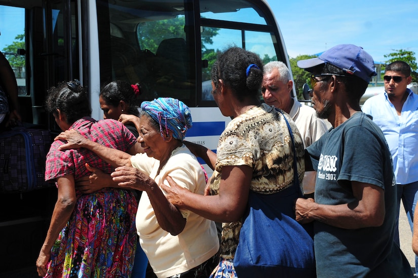 TRUJILLO, Honduras – Patients and their escorts board a bus provided by the Honduran Government, en route to receiving eye surgery and glasses as part of Continuing Promise 2015 in Trujillo, Honduras, Aug 27. 2015. Joint Task Force-Bravo partnered with the Government of Honduras to fly the patients to Trujillo for treatment as part of this large-scale humanitarian assistance and partnership-building exercise. (U.S. Air Force photo by Capt. Christopher Love)