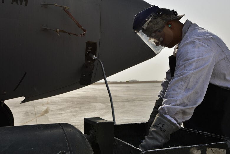 Senior Airman Matthew Krzywiecki, 379th Expeditionary Aircraft Maintenance Squadron, 746th Expeditionary Aircraft Maintenance Unit, recharges a C-130 Hercules with liquid oxygen September 9, 2015 at Al Udeid Air Base, Qatar. The 746th AMU cryogenics airmen work with liquid nitrogen and liquid oxygen that is recharged into aircraft, providing aircrews with pure oxygen at altitude during missions in support of Operation Inherent Resolve. Krzywiecki is a deployed member from the 911th Airlift Wing, Pittsburgh International Airport Air Reserve Station, Pa.(U.S. Air Force photo/Staff Sgt. Alexandre Montes)  