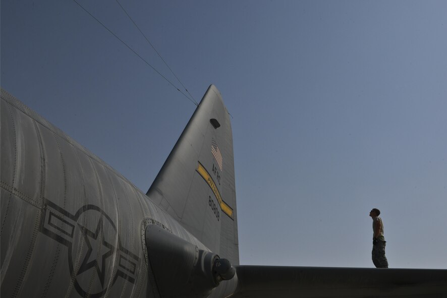 Staff Sgt. Jordan Hale, 379th Expeditionary Aircraft Maintenance Squadron, 746th Expeditionary 
Aircraft Maintenance Unit, inspects the movement of a C-130 Hercules rudder which controls the aircraft yaw as part of his daily maintenance to ensure the aircraft is safe to fly September 9, 2015 at Al Udeid Air Base, Qatar. The 746th AMU airmen are responsible for ensuring aircraft are maintained to exact standards to support Operation Inherent Resolve. Hale is deployed out of 911th Airlift Wing, Pittsburgh International Airport Air Reserve Station, Pa. (U.S. Air Force photo/Staff Sgt. Alexandre Montes)    
