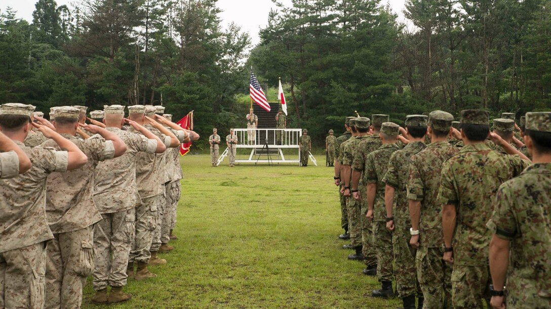 U.S. Marines and Japan Ground Self Defense Force members salute as each nations’ national anthem plays marking the beginning of Forest Light 16-1 at Camp Imazu, Takashima, Japan, Sept. 6, 2015. Forest Light will take place Sept. 7-18 with approximately 240 Marines working next to 350 JGSDF members. The exercise will consist of combined mortar live fire, establishing forward arming and refueling points, combined helicopter borne skills and combined-arms training. The JGSDF members are from 50th Infantry Regiment, 14th Brigade. The Marines are with 1st Battalion, 2nd Marine Regiment currently assigned to 4th Marine Regiment, 3rd Marine Division, III Marine Expeditionary Force. 