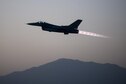 An F-16 Fighting Falcon assigned to the 480th Fighter Squadron at Spangdahlem Air Base, Germany, participates in a training sortie with F-22 Raptors Sept. 9, 2015, over the U.K. The Air Force deployed four F-22s, one C-17 Globemaster III and approximately 60 Airmen and their associated equipment to Spangdahlem AB. The F-22s are deployed from the 95th Fighter Squadron at Tyndall Air Force Base, Fla. (U.S. Air Force photo/Tech. Sgt. Jason Robertson)