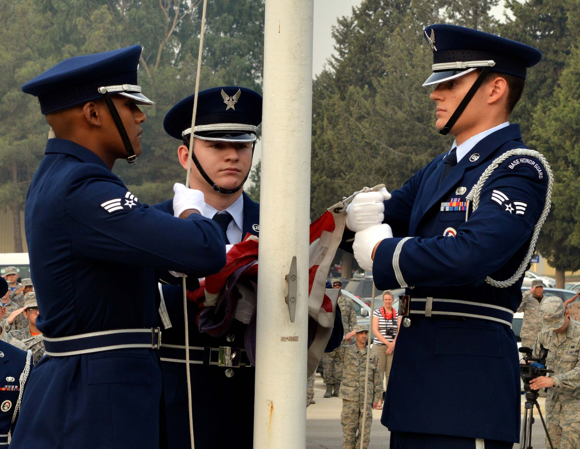 Members of the honor guard raise the U.S. flag during a 9/11 Remembrance Ceremony Sept. 11, 2015, at Incirlik Air Base, Turkey. Members from the 39th Air Base Wing, 10th Tanker Base Command and Spanish Patriot Unit attended the event in honor of 9/11. (U.S. Air Force photo/Senior Airman Michael Battles)