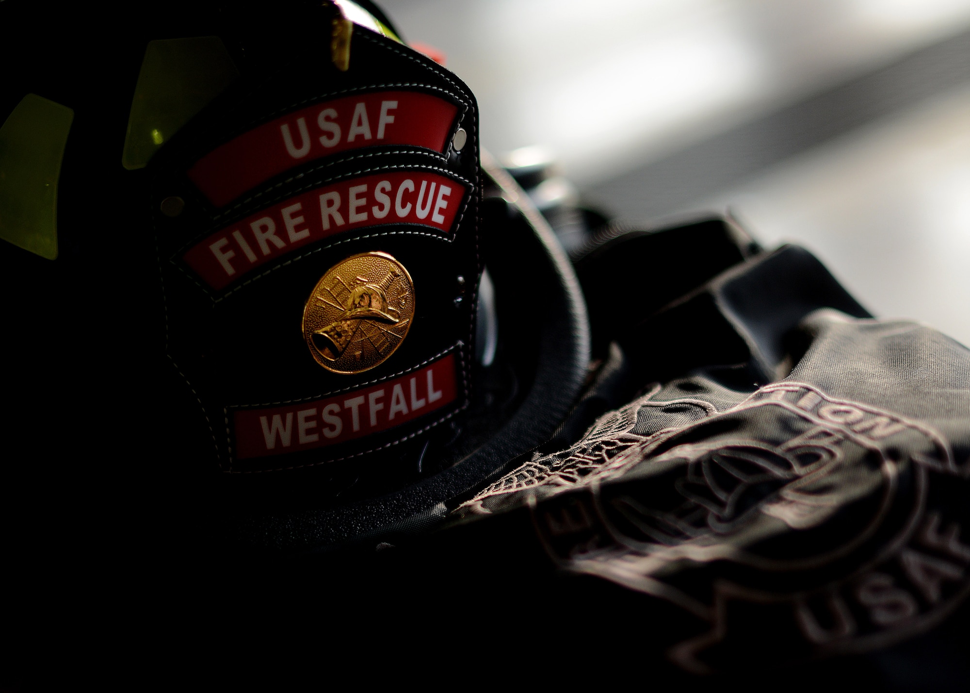A firefighter’s helmet rests on the ground Sept. 11, 2015, at Aviano Air Base, Italy. A remembrance ceremony was held to commemorate the 11th anniversary of the Sept. 11, 2001 terrorist attacks that claimed the lives of approximately 3,000 innocent people at the World Trade Center, Shanksville, Penn., and the Pentagon. (U.S. Air Force photo/Staff Sgt. Evelyn Chavez)