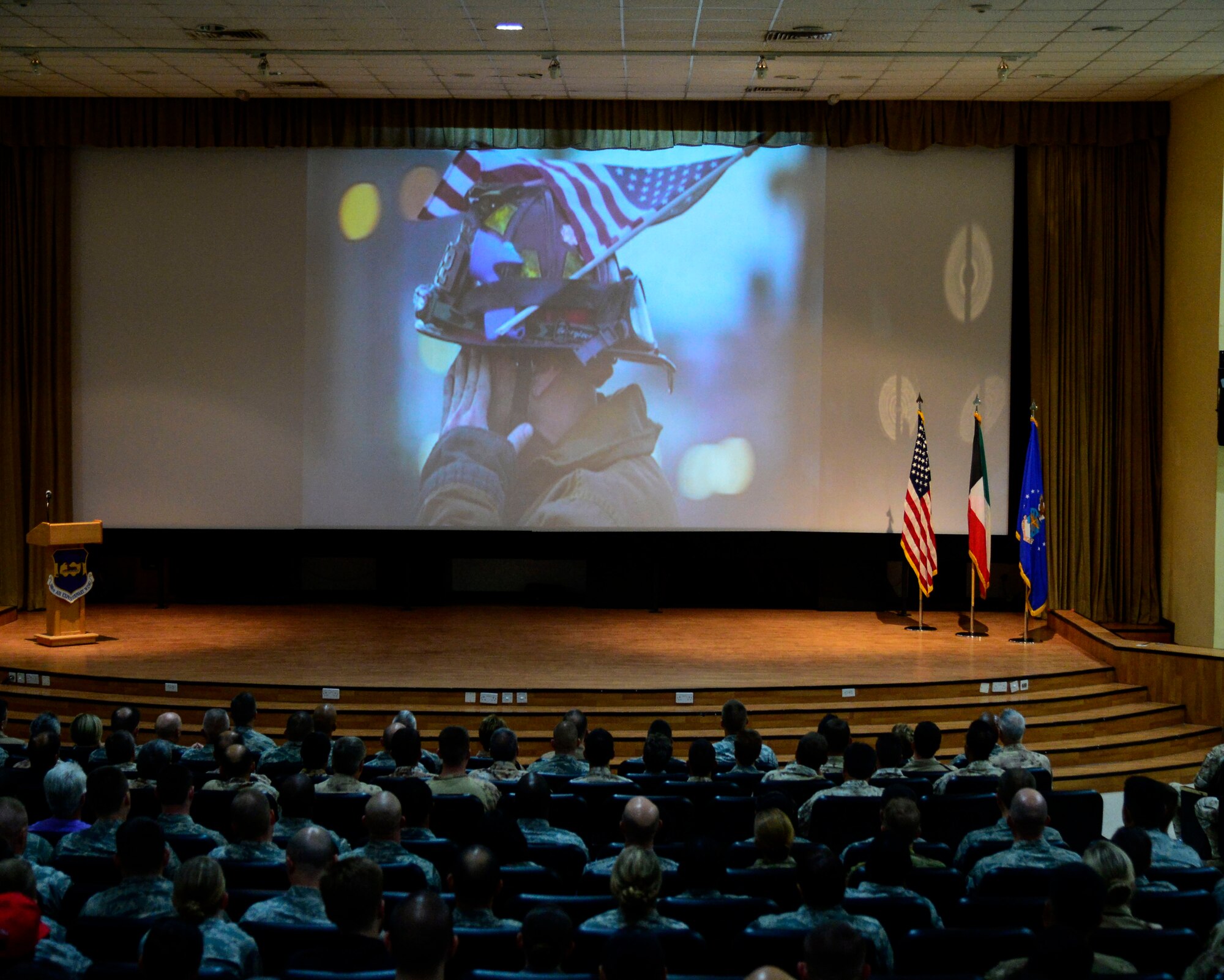 Members of the 386th Air Expeditionary Wing and coalition partners pay tribute to victims of 9/11 during a ceremony at an undisclosed location in Southwest Asia, Sept. 11, 2015. Attendees remembered and honored those who lost their lives at the World Trade Center, the Pentagon, the fields of Shanksville, Pa. and on the battlegrounds of Iraq and Afghanistan. (U.S. Air Force photo by Senior Airman Racheal E. Watson/Released)