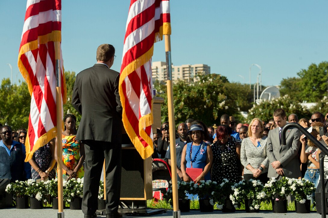 Defense Secretary Ash Carter delivers remarks during a remembrance ceremony at the Pentagon Memorial, Sept. 11, 2015, to honor the memory of those killed in the 9/11 terrorist attack 14 years ago. The family and friends of those killed in the attack attended the ceremony. DoD photo by U.S. Air Force Senior Master Sgt. Adrian Cadiz