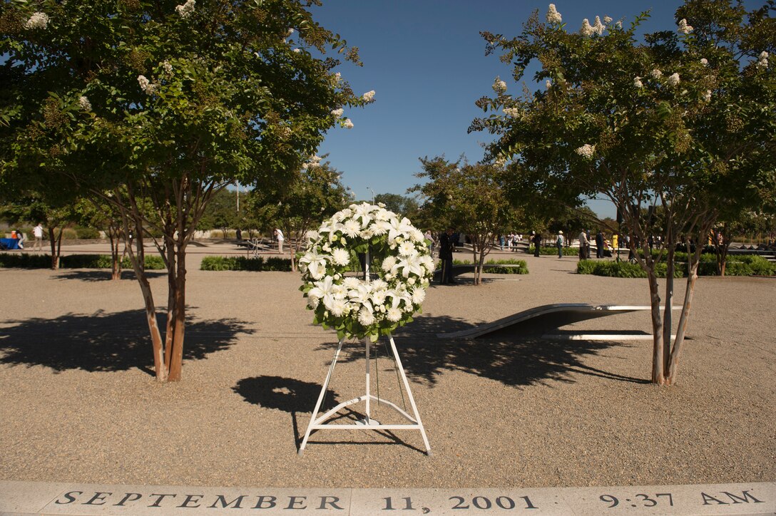 A wreath stands during the remembrance ceremony at the Pentagon Memorial, Sept. 11, 2015, to honor the memory of those killed in the 9/11 terrorist attack. DoD photo by U.S. Air Force Senior Master Sgt. Adrian Cadiz