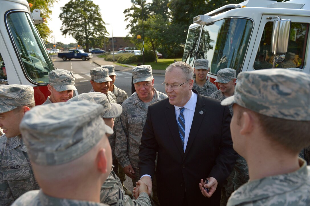 U.S. Deputy Defense Secretary Bob Work visits U.S. airmen on Royal Air Force Lakenheath, England, Sept. 11, 2015. DoD photo by Glenn Fawcett