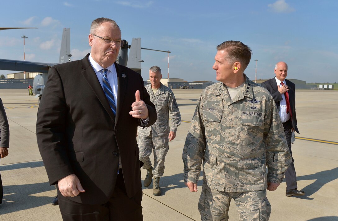 U.S. Deputy Defense Secretary Bob Work gives a thumbs-up while walking with U.S. Air Force Lt. Gen. Timothy Ray upon arriving for a visit to U.S. Air Force operations on Royal Air Force Lakenheath, England, Sept. 11, 2015. Ray is commander of the 3rd Air Force and 17th Expeditionary Air Force. DoD photo by Glenn Fawcett