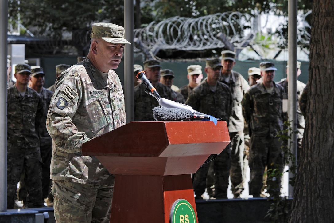 U.S. Army Gen. John. F. Campbell, commander of the Resolute Support Mission and U.S. Forces in Afghanistan, addressed troops on the anniversary of the 9/11 attacks during a ceremony in Kabul, Afghanistan, Sept. 11, 2015. U.S. Air Force photo by Tommy Fuller