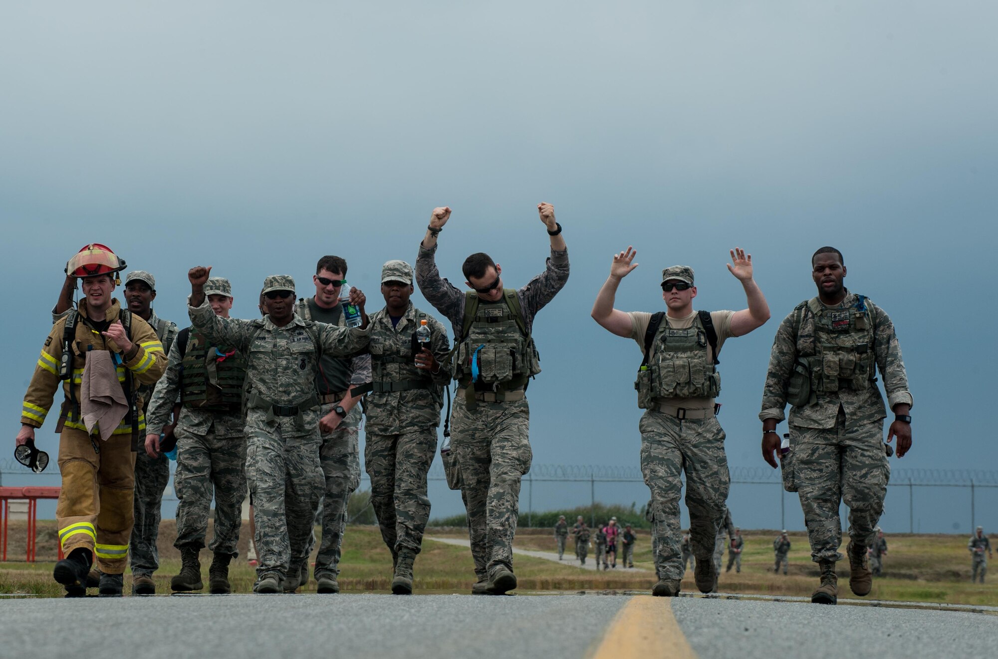 Airmen from the 8th Fighter Wing partake in a six-mile ruck march as part of 9-11 Remembrance Day at Kunsan Air Base, Republic of Korea, Sept. 11, 2015. The day's events also included a first-responder stair climb and a 9-11 Remembrance Day Ceremony. (U.S. Air Force photo by Staff Sgt. Nick Wilson/Released)