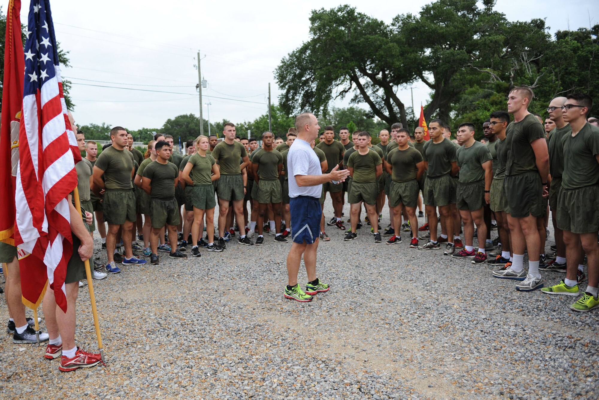 Col. Scott Solomon, 81st Training Group commander, speaks to members of the Keesler Air Force Base Marine Detachment following a 3.7 mile remembrance run across the Ocean Springs/Biloxi Bridge during a physical training session Sept. 11, 2015. The event honored those who lost their lives during the 9/11 attacks. (U.S. Air Force photo by Kemberly Groue)