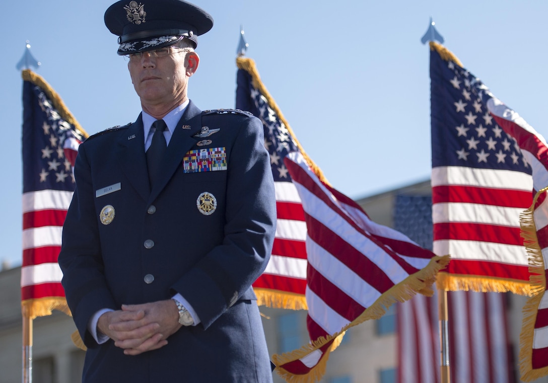 Air Force Gen. Paul J. Selva, vice chairman of the Joint Chiefs of Staff, pauses at the Pentagon Memorial before a remembrance ceremony honoring those lost in the 9/11 attack, Sept. 11, 2015. DoD photo by Petty Officer 2nd Class Dominique A. Pineiro