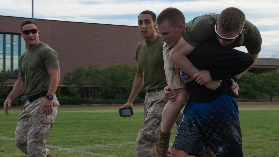 An Arizona State University student attempts the Combat Fitness Test, Sept. 10, 2015, at ASU Tempe Campus as part of Marine Week Phoenix. Marine Week Phoenix will allow the community that the Marine Corps is Americas force in readiness.