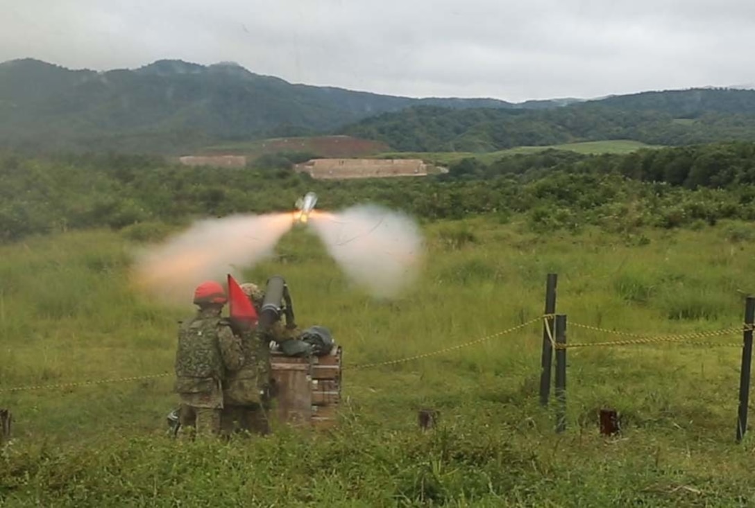 Sgt. Sugimoto Yoshitaka, fires the Type 01 LMAT Anti-Tank Missile System during Forest Light 16-1 at Camp Imazu, Takashima, Japan, Sept. 7, 2015. The Japanese Ground Self-Defense Force and U.S. Marines shared knowledge about different anti-tank missile systems. After giving specifications of their respective weapon systems, the two forces used practice rounds to demonstrate how well the weapon systems work. Forest Light will take place Sept. 7-18 with approximately 240 Marines working next to 350 JGSDF members. The exercise will consist of mortar live fire, establishing forward arming and refueling points training, helicopter borne skills and combined-arms training. Yoshitaka is an anti-tank missile man with 50th Infantry Regiment, 14th Brigade.