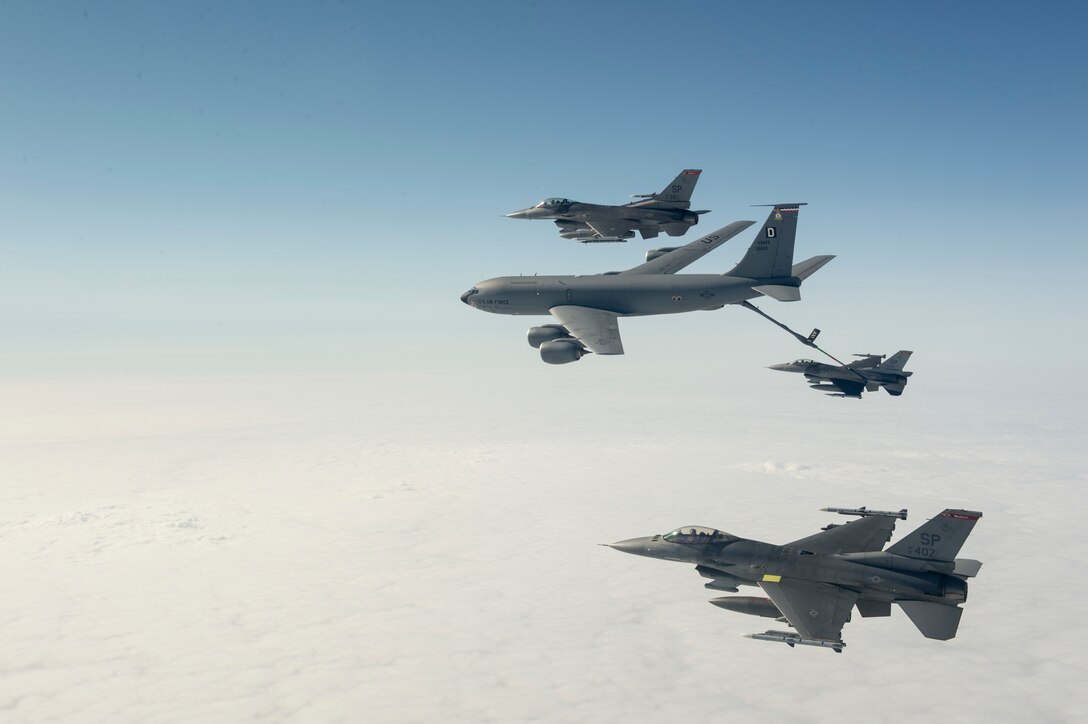 A U.S. Air Force F-16 Fighting Falcon participates in a training sortie with F-22 Raptors over the United Kingdom, Sept. 9, 2015. The Fighting Falcon is assigned to the 480th Fighter Squadron; the Raptors deployed from the 95th Fighter Squadron. U.S. Air Force photo by Tech. Sgt. Jason Robertson