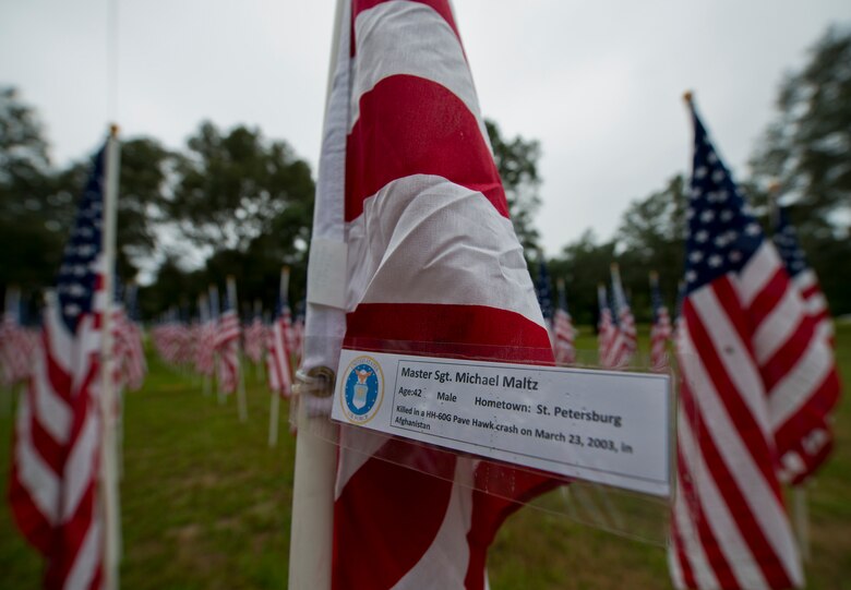 Master Sgt. Michael Maltz’s name was attached to one of the flags set up on the Field of Valor display in Niceville, Fla. Sept. 11.  The display features 13 rows of 27 flags and one extra to create the field.  Names of recently fallen military members, including 10 Airmen, adorn each of the approximately 352 American flags.  The Field will be on display through Sept. 19 at the Mullet Festival grounds and is free to the public.  (U.S. Air Force photo/Tech. Sgt. Sam King)