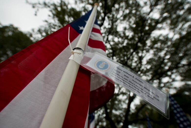 Maj. William Downs’ name was attached to one of the flags set up on the Field of Valor display in Niceville, Fla. Sept. 11.  The display features 13 rows of 27 flags and one extra to create the field.  Names of recently fallen military members, including 10 Airmen, adorn each of the approximately 352 American flags.  The Field will be on display through Sept. 19 at the Mullet Festival grounds and is free to the public.  (U.S. Air Force photo/Tech. Sgt. Sam King)