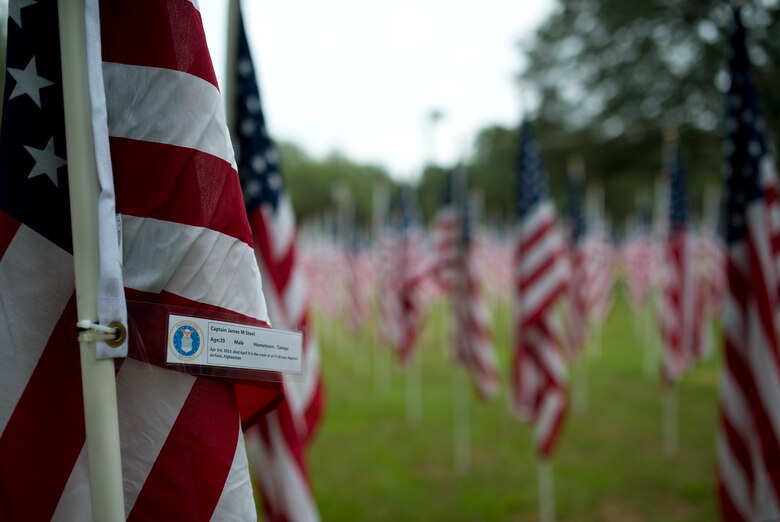 Capt. James Steel’s name was attached to one of the flags set up on the Field of Valor display in Niceville, Fla. Sept. 11.  The display features 13 rows of 27 flags and one extra to create the field.  Names of recently fallen military members, including 10 Airmen, adorn each of the approximately 352 American flags.  The Field will be on display through Sept. 19 at the Mullet Festival grounds and is free to the public.  (U.S. Air Force photo/Tech. Sgt. Sam King)