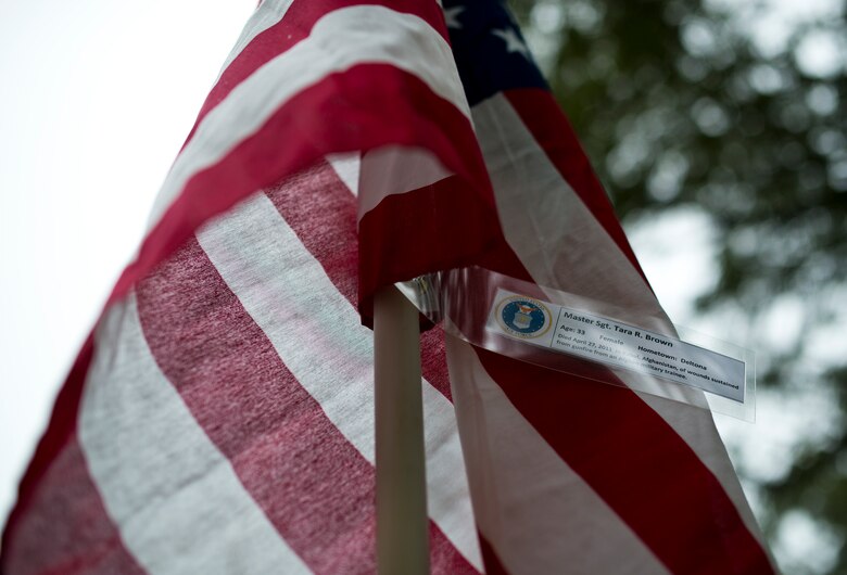 Master Sgt. Tara Brown’s name was attached to one of the flags set up on the Field of Valor display in Niceville, Fla. Sept. 11.  The display features 13 rows of 27 flags and one extra to create the field.  Names of recently fallen military members, including 10 Airmen, adorn each of the approximately 352 American flags.  The Field will be on display through Sept. 19 at the Mullet Festival grounds and is free to the public.  (U.S. Air Force photo/Tech. Sgt. Sam King)