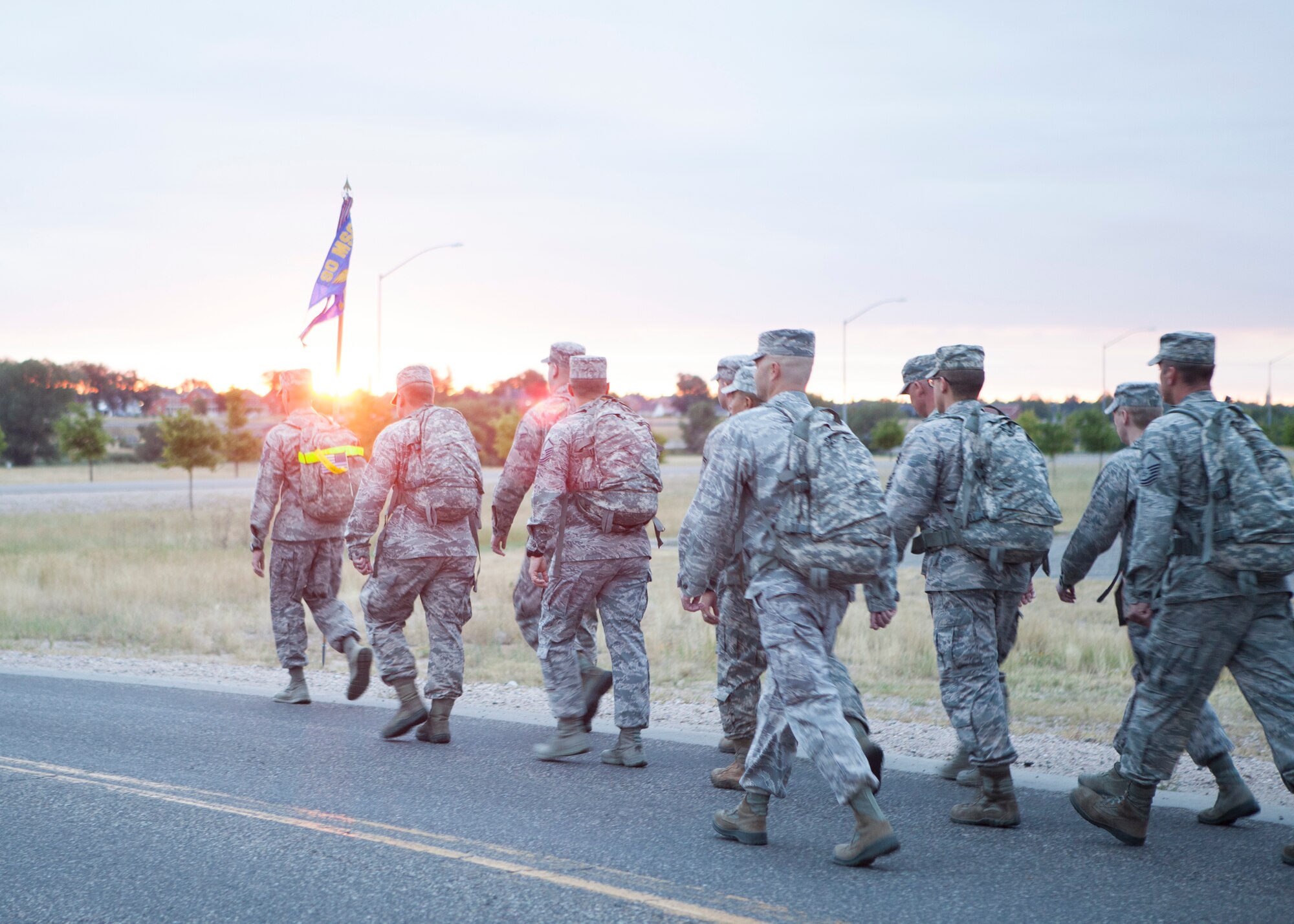 Airmen from 90th Logistics Readiness Squadron ruck march along the streets of F.E. Warren Air Force Base, Wyo., Sept. 11, 2015, in remembrance of the Sept. 11 attacks against the U.S. This year marks the 14th anniversary of the attack. (U.S. Air Force photo by Lan Kim)