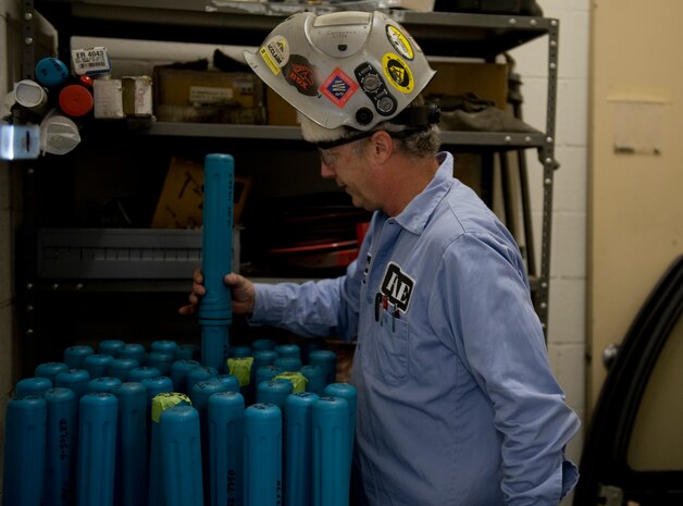 Rich Samanich, 57th Maintanence Group aircraft metals technology lead, searches for a welding rod at the Aircraft Metals Technology shop on Nellis Air Force Base, Nev., Sept. 3, 2015. The metals shop welds a multitude of equipment, including aircraft parts and aerospace ground repair equipment. (U.S. Air Force photo by Airman 1st Class Rachel Loftis)  