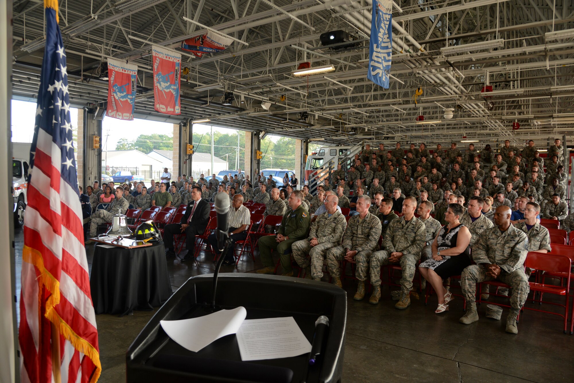 More than 150 members of Team Seymour attended a 9/11 Remembrance ceremony, Sept. 11, 2015, at Seymour Johnson Air Force Base, North Carolina. The ceremony featured a 21-gun salute, bell ringing and slideshow. (U.S. Air Force photo/Staff Sgt. Chuck Broadway)