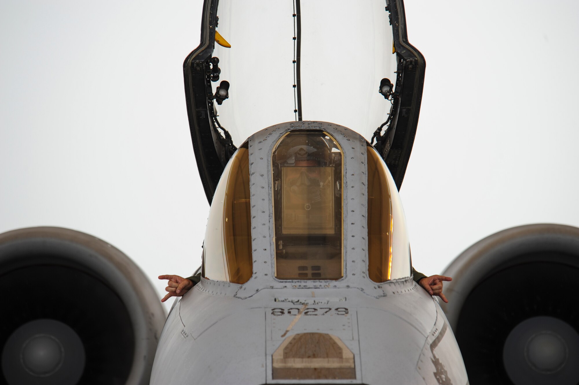 U. S. Air Force Capt. Chad Rudolph, 357th Fighter Squadron A-10C Thunderbolt II pilot, signals to his crew chief during a preflight inspection at Davis-Monthan Air Force Base, Ariz., Sept. 10, 2015, prior to departing for Nellis Air Force Base, Nev., to participate in Green Flag 15-10.  Green Flag is an advanced, realistic and relevant air to surface training exercise that prepares joint and coalition warfighters to meet combatant commander requirements across air, space and cyberspace.  (U.S. Air Force photo by Senior Airman Chris Massey/Released)