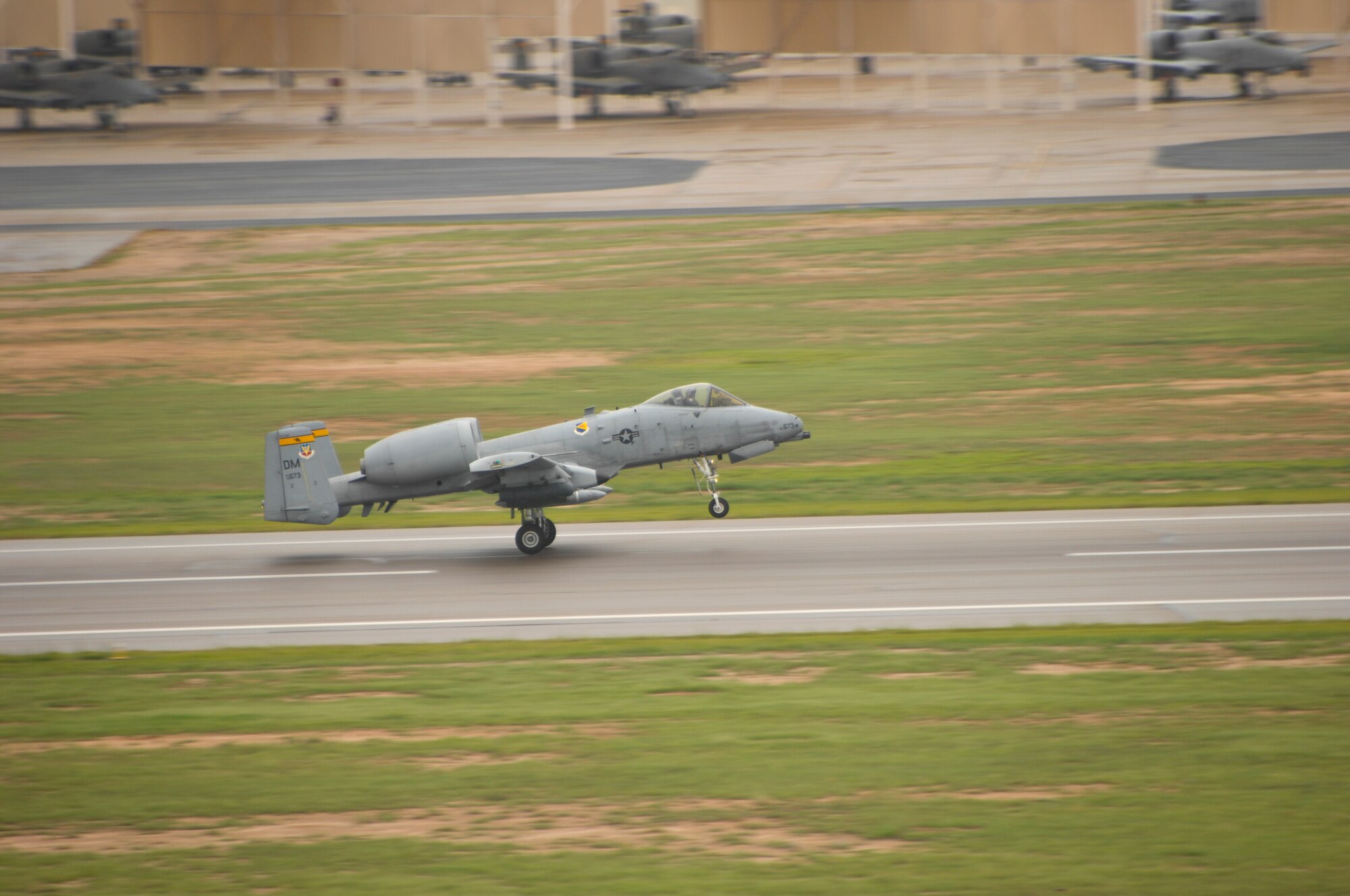 An A-10C Thunderbolt II from the 357th Fighter Squadron departs Davis-Monthan Air Force Base, Ariz., Sept. 10, 2015, to participate in Green Flag 15-10 at Nellis Air Force Base, Nev.  Green Flag is an advanced, realistic and relevant air to surface training exercise that prepares joint and coalition warfighters to meet combatant commander requirements across air, space and cyberspace.  (U.S. Air Force photo by Airman Basic Nathan H. Barbour/Released)