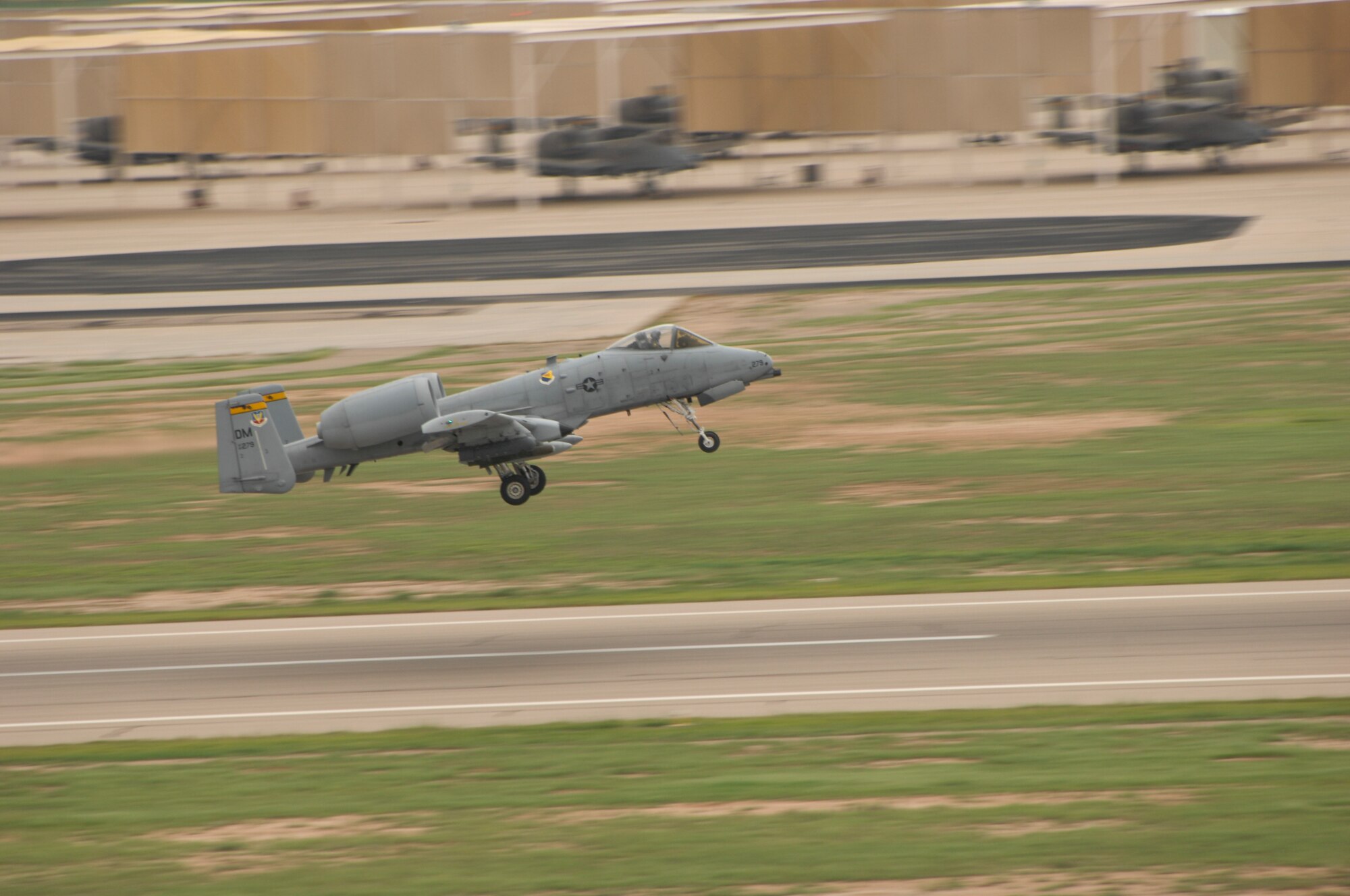 An A-10C Thunderbolt II from the 357th Fighter Squadron departs Davis-Monthan Air Force Base, Ariz., Sept. 10, 2015, to participate in Green Flag 15-10 at Nellis Air Force Base, Nev.  Green Flag is an advanced, realistic and relevant air to surface training exercise that prepares joint and coalition warfighters to meet combatant commander requirements across air, space and cyberspace.  (U.S. Air Force photo by Airman Basic Nathan H. Barbour/Released)