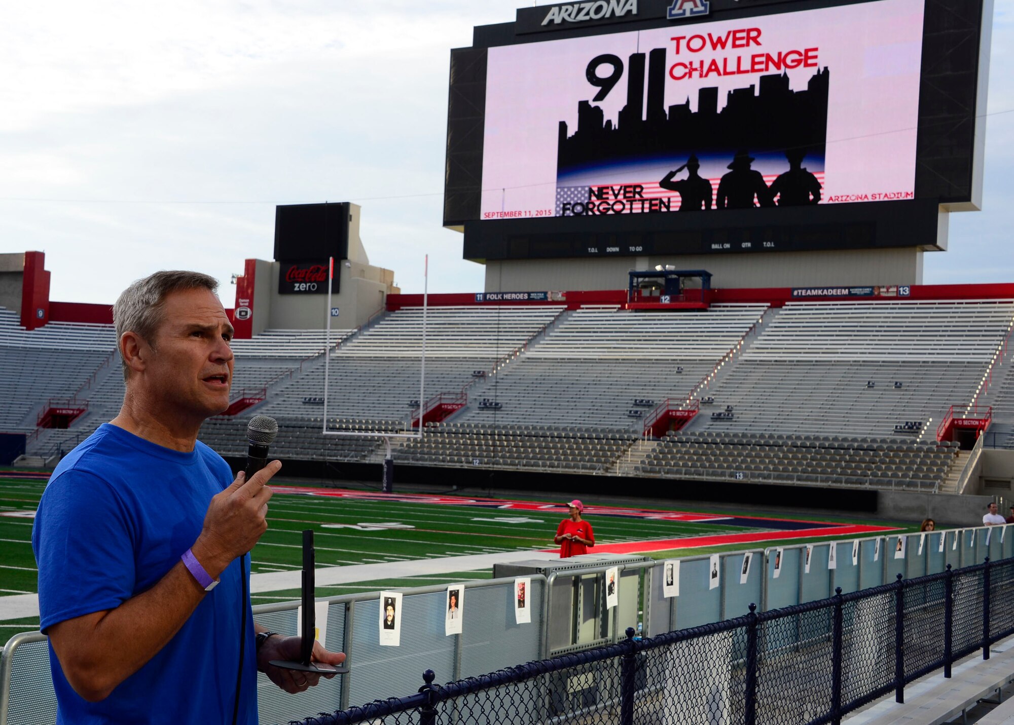 Lt. Gen. Chris Nowland, 12th Air Force (Air Forces Southern) commander, speaks to participants about patriotism during the 9/11 Tower Challenge at the University of Arizona football stadium in Tucson, Ariz., Sept. 11, 2015. The 9/11 Tower Challenge was held to honor those who lost their lives during the Sept. 11, 2001 attacks and to show their support first responders and military members who continue to protect the U.S. from foreign and domestic threats. During the 9/11 Tower Challenge, participants climbed 2,071 steps representing the number of steps that were in the Twin Towers. (U.S. Air Force Photo by Tech. Sgt. Heather R. Redman/Released)