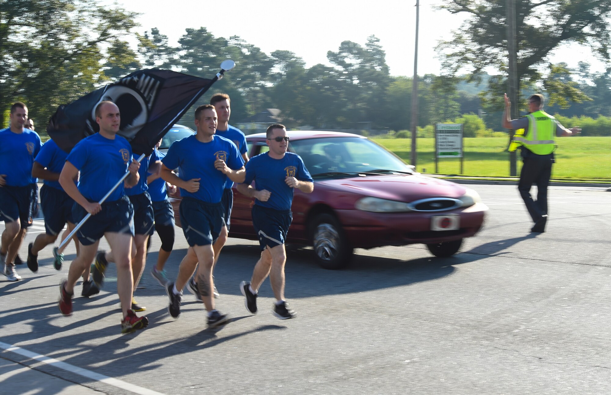 Airmen from the 23d Logistics Readiness Squadron make their way down Bemiss Road during the Tiger-thon Sept. 11, 2015, in Valdosta, Ga. The 23-mile run started on base, continued through the local community and ended at Moody’s Prisoners of War/Missing in Action Memorial Park. (U.S. Air Force photo by Senior Airman Ceaira Tinsley/Released)