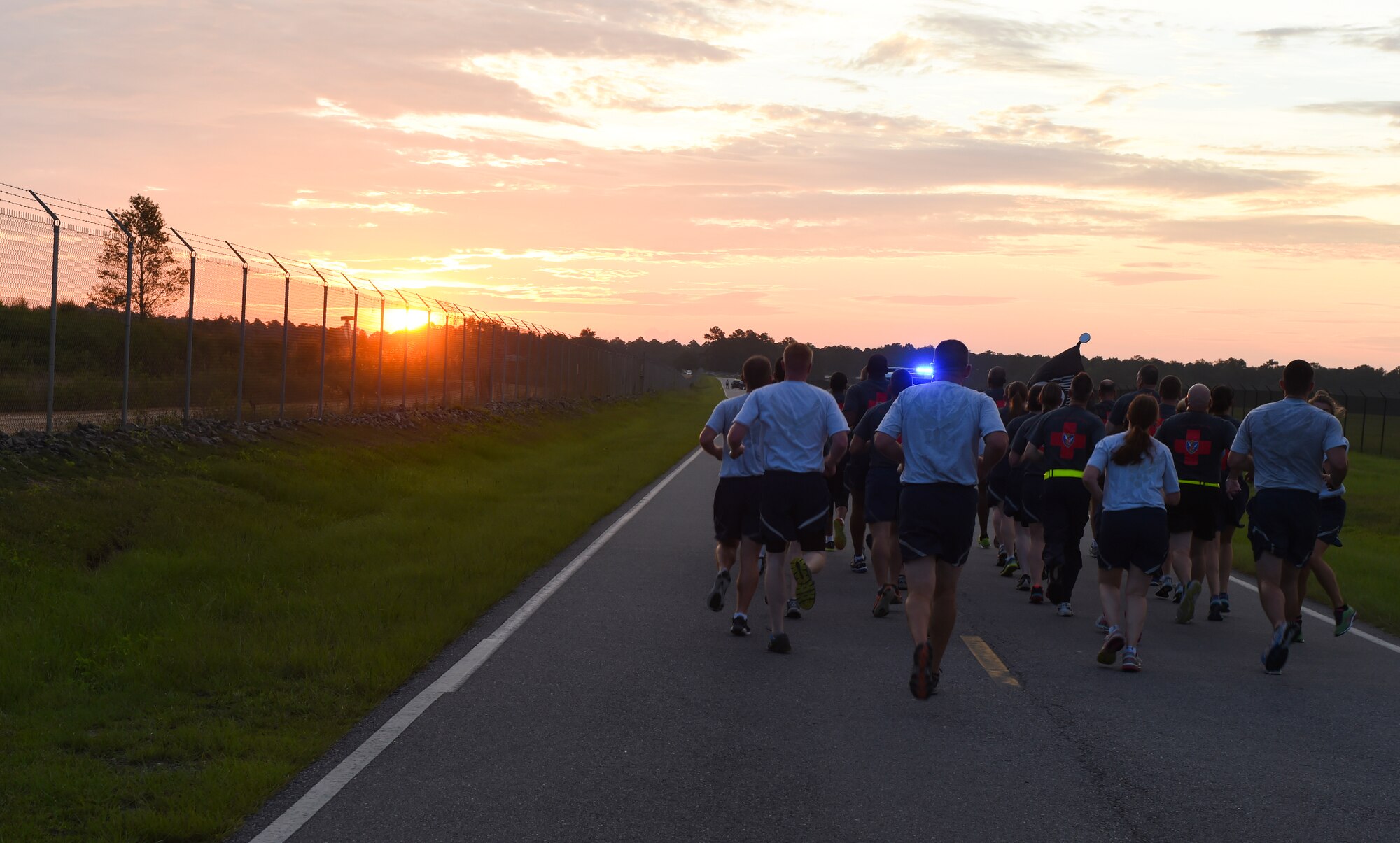 Airmen from the 23d Medical Group run during the Tiger-thon Sept. 11, 2015, at Moody Air Force Base, Ga. The run commemorated the sacrifices of approximately 83,000 prisoners of war and those missing in action past and present. (U.S. Air Force photo by Senior Airman Ceaira Tinsley/Released)