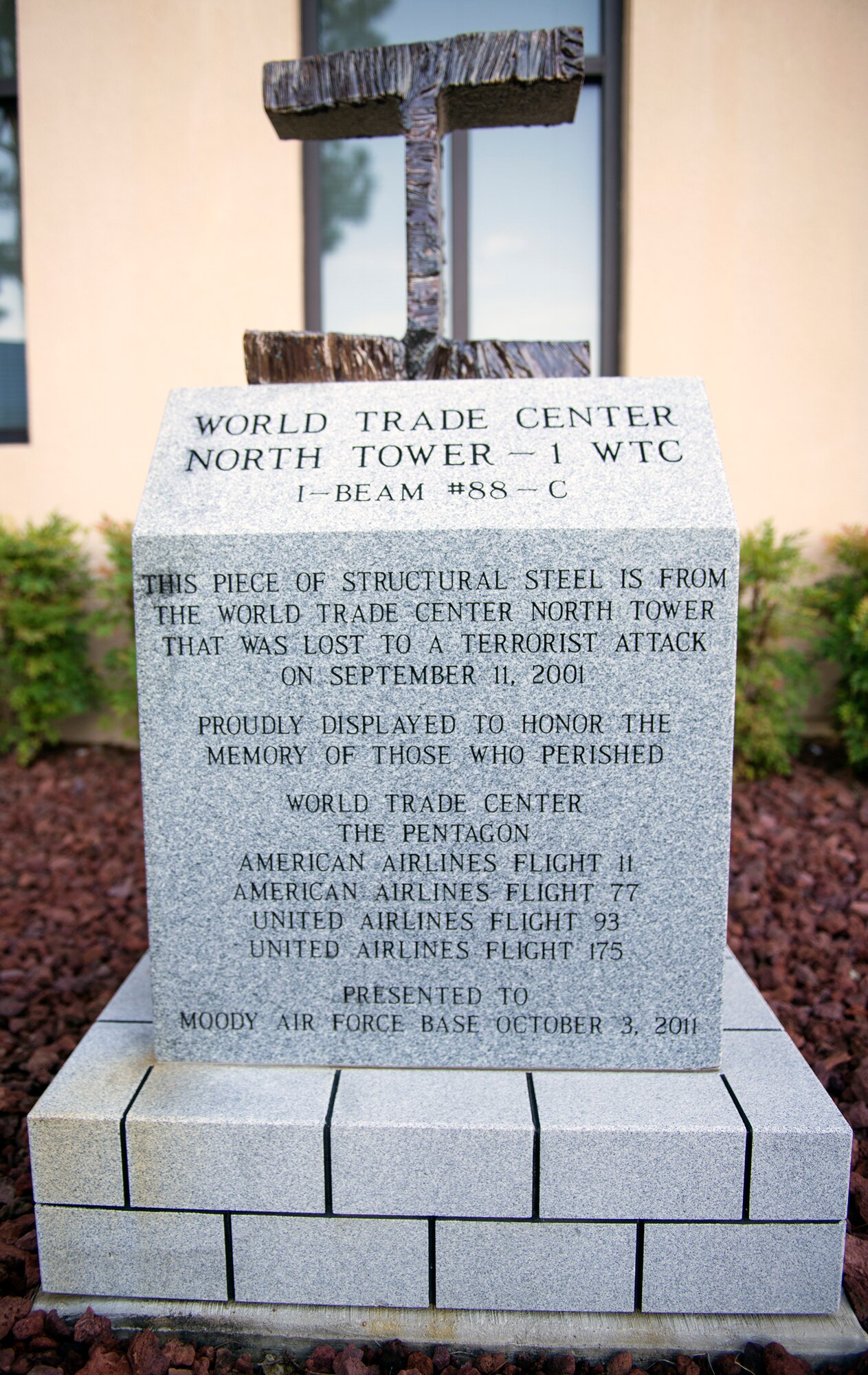 A 9/11 memorial rests in front of the Moody Air Force Base, Ga., fire department Sept. 11, 2015, at Moody AFB. Moody received a piece of structural steel from the World Trade Center’s North Tower Oct. 3, 2011 as thanks for the base’s support during 9/11.
 (U.S. Air Force photo by Airman 1st Class Greg Nash/Released)  
